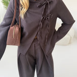 Giacca bacchettata con chiusura con fiocchi brown