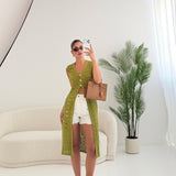 Gilet lungo traforato con bottoni pistacchio