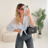 Blusa coreana velata in 100 cotone celeste