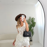 Blusa traforata in crochet bianca