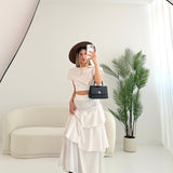 Set blusa + gonna balze a pois bianco
