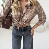 Camicia tartan con tasca in paillettes camel