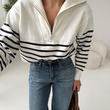 Maglione con zip a righe bianca