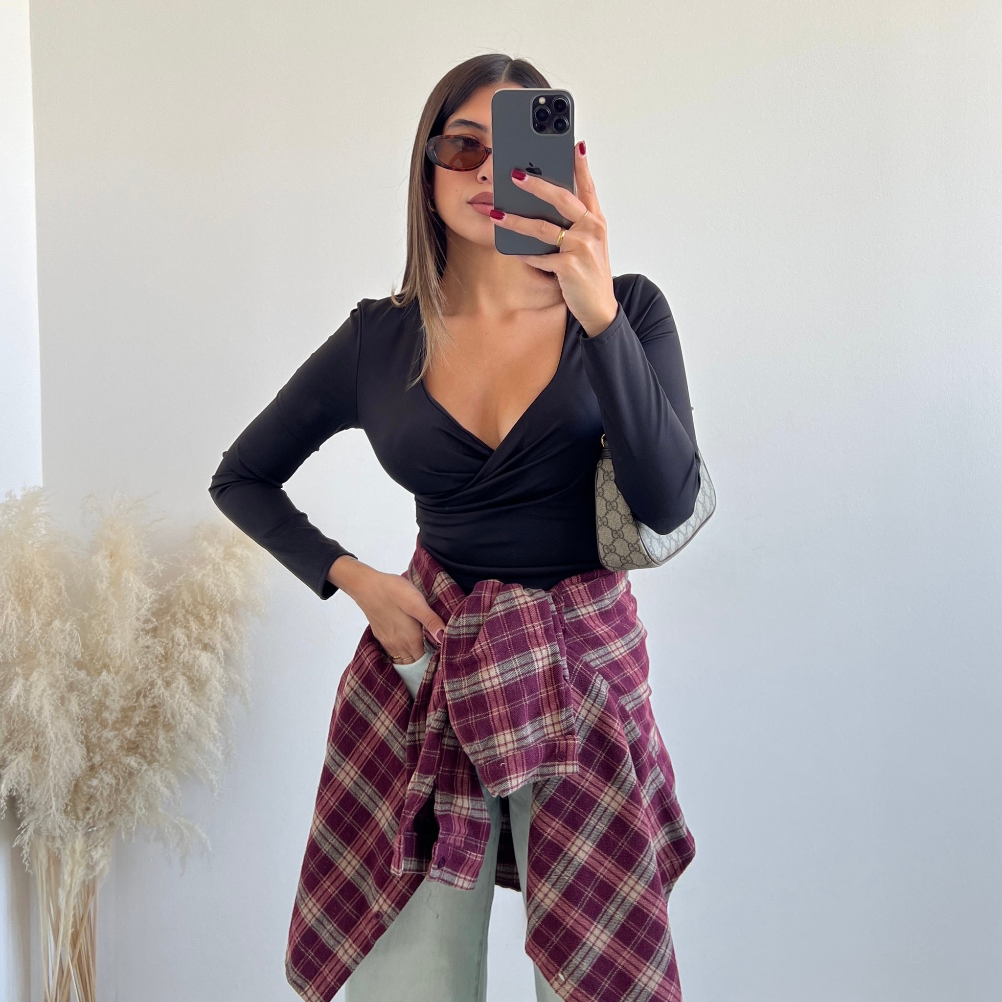 Top manica lunga con coppe nero