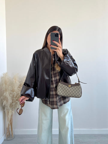 Bomber in vinile con zip testa di moro