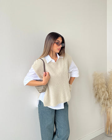 Gilet smanicato con fiocchi laterali beige