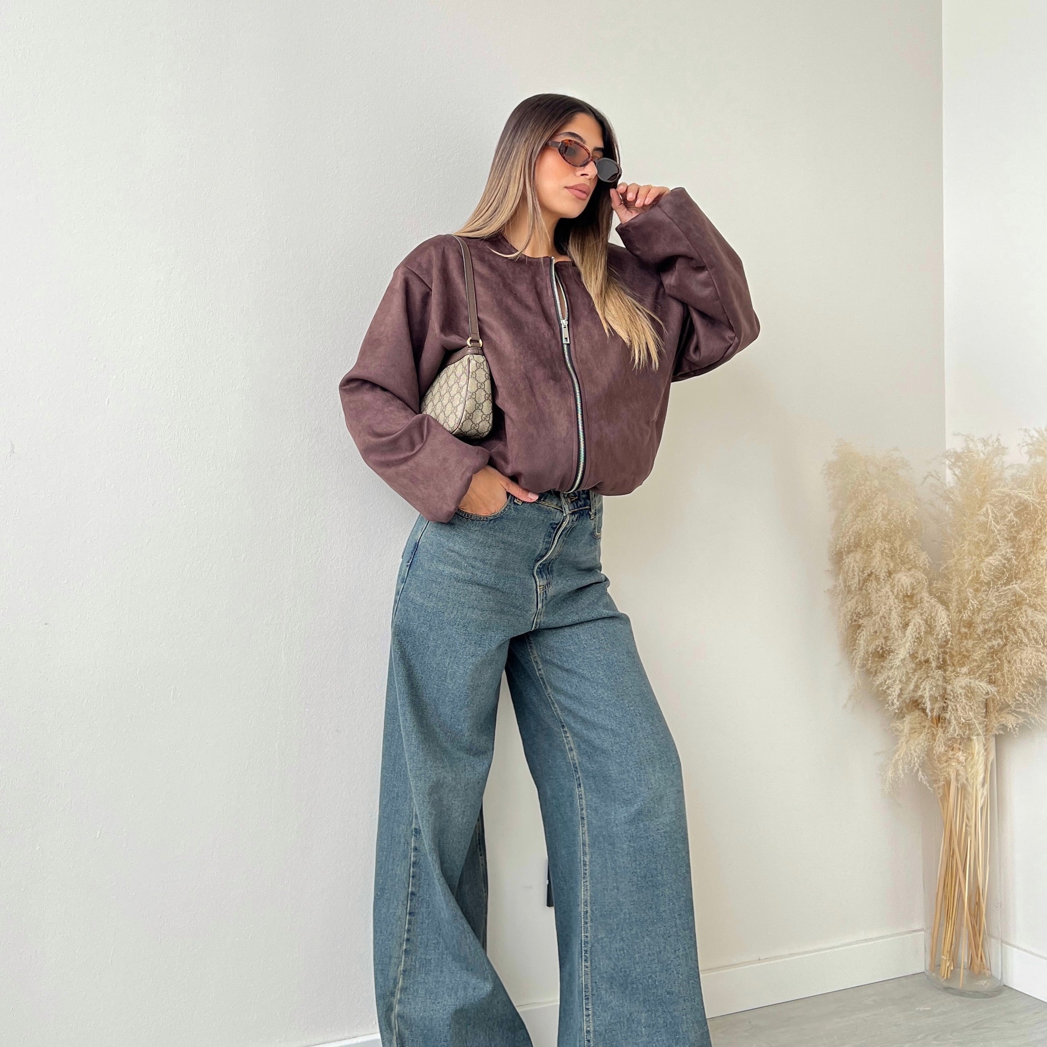 Bomber girocollo con zip testa di moro
