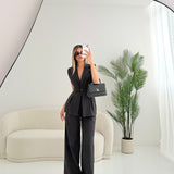 Set gilet sfiancato + pantalone bacchetatto nero