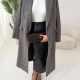Cappotto doppiopetto in lana pied de poule nero e panna