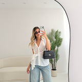 Blusa velata con nodo laterale bianca