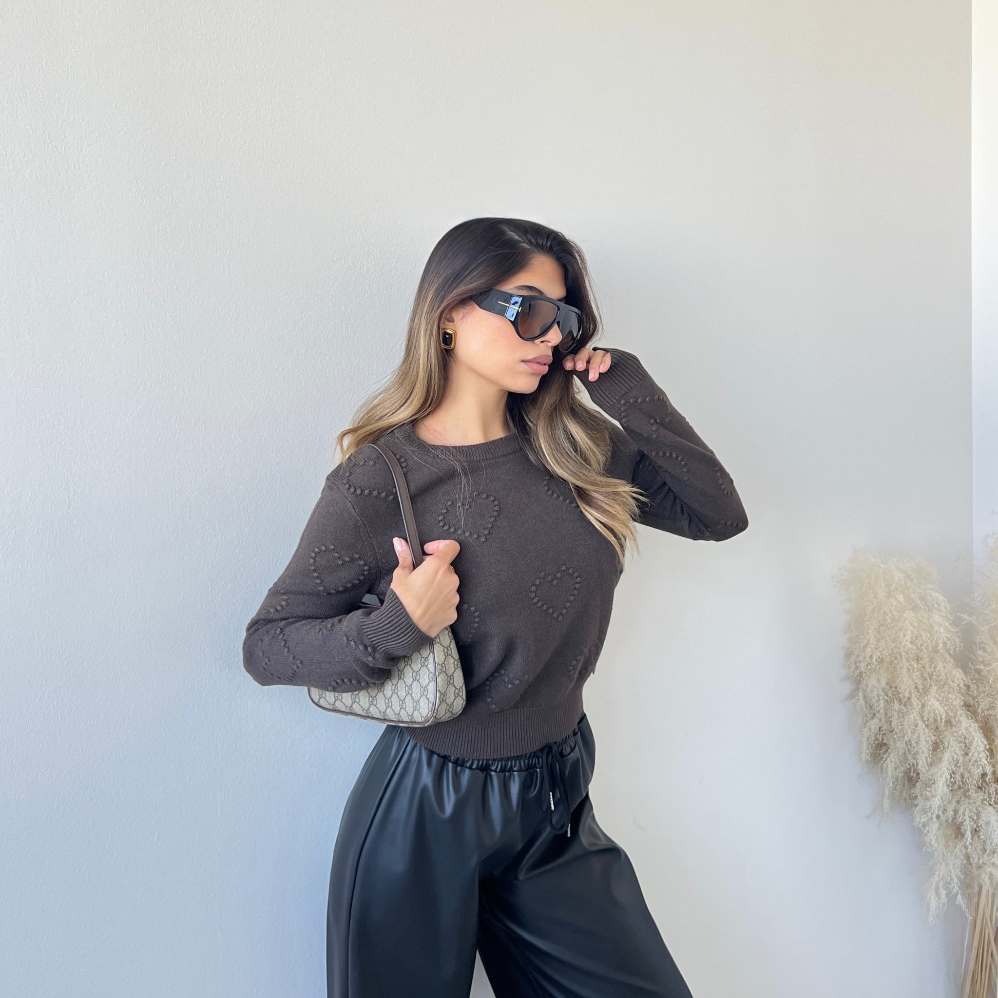 Pull con cuori testa di moro