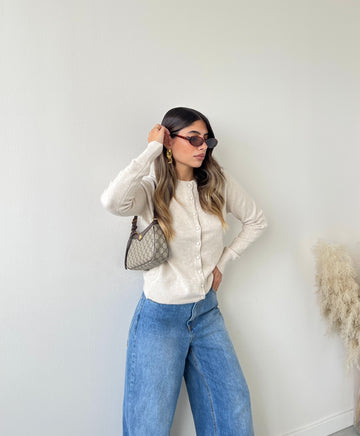 Pull con bottoni foderati beige