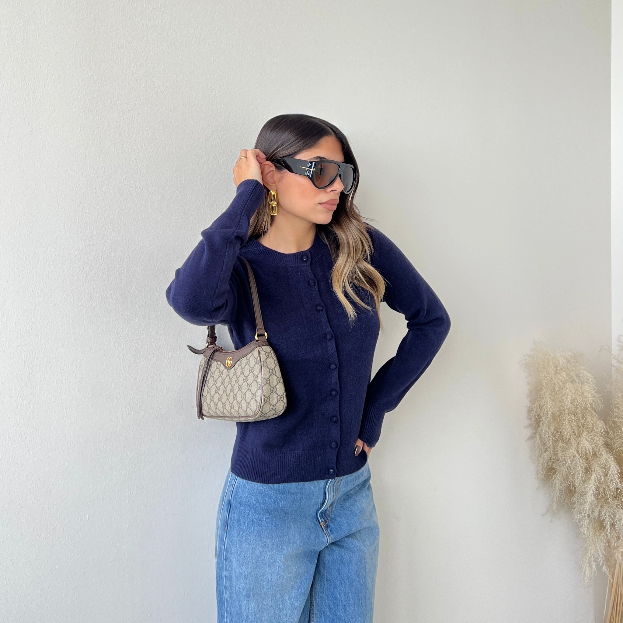 Pull con bottoni foderati blu