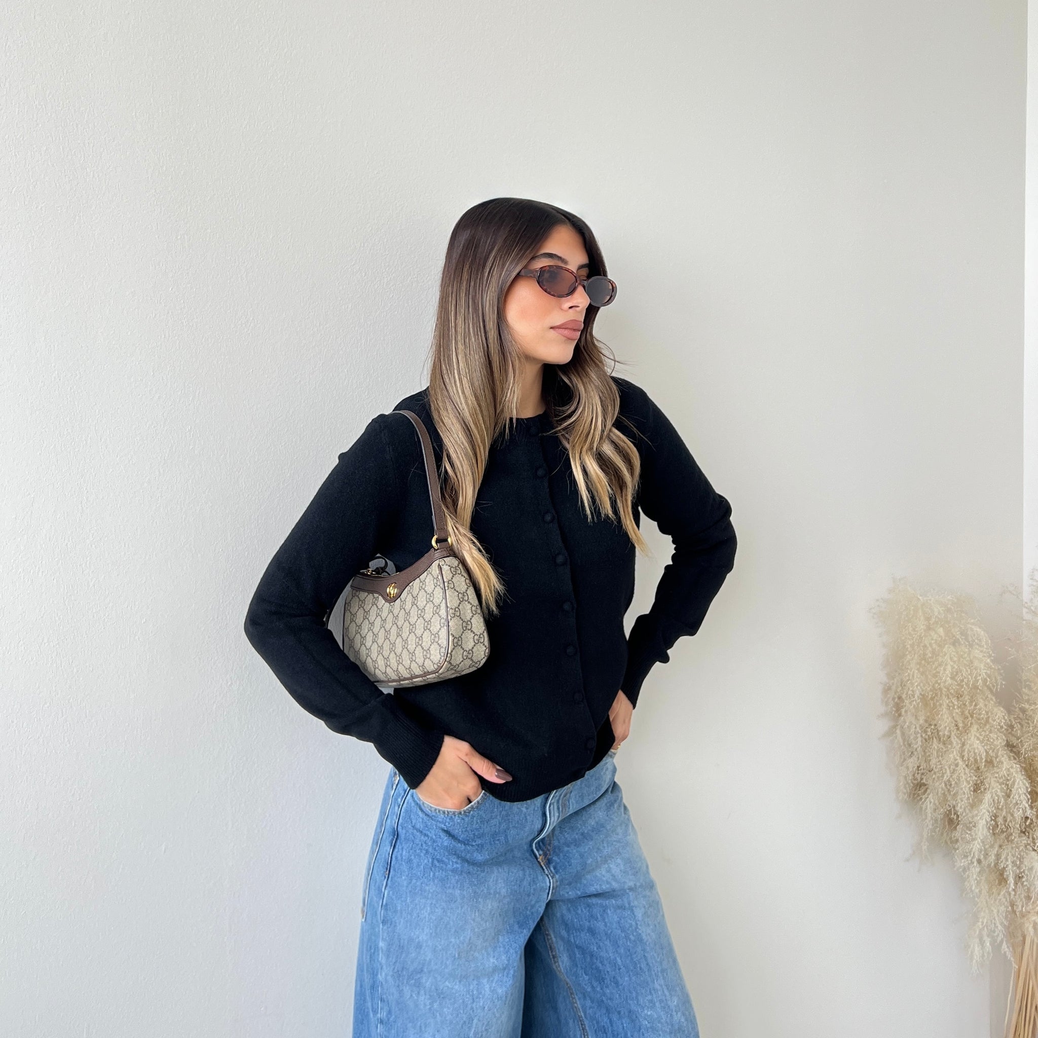 Pull con bottoni foderati nero