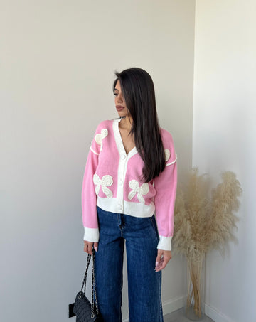 Cardigan con fiocchi rosa