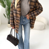 Cappotto in panno tartan con tasche laterali