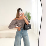 Blusa a barca con schiena scoperta fango