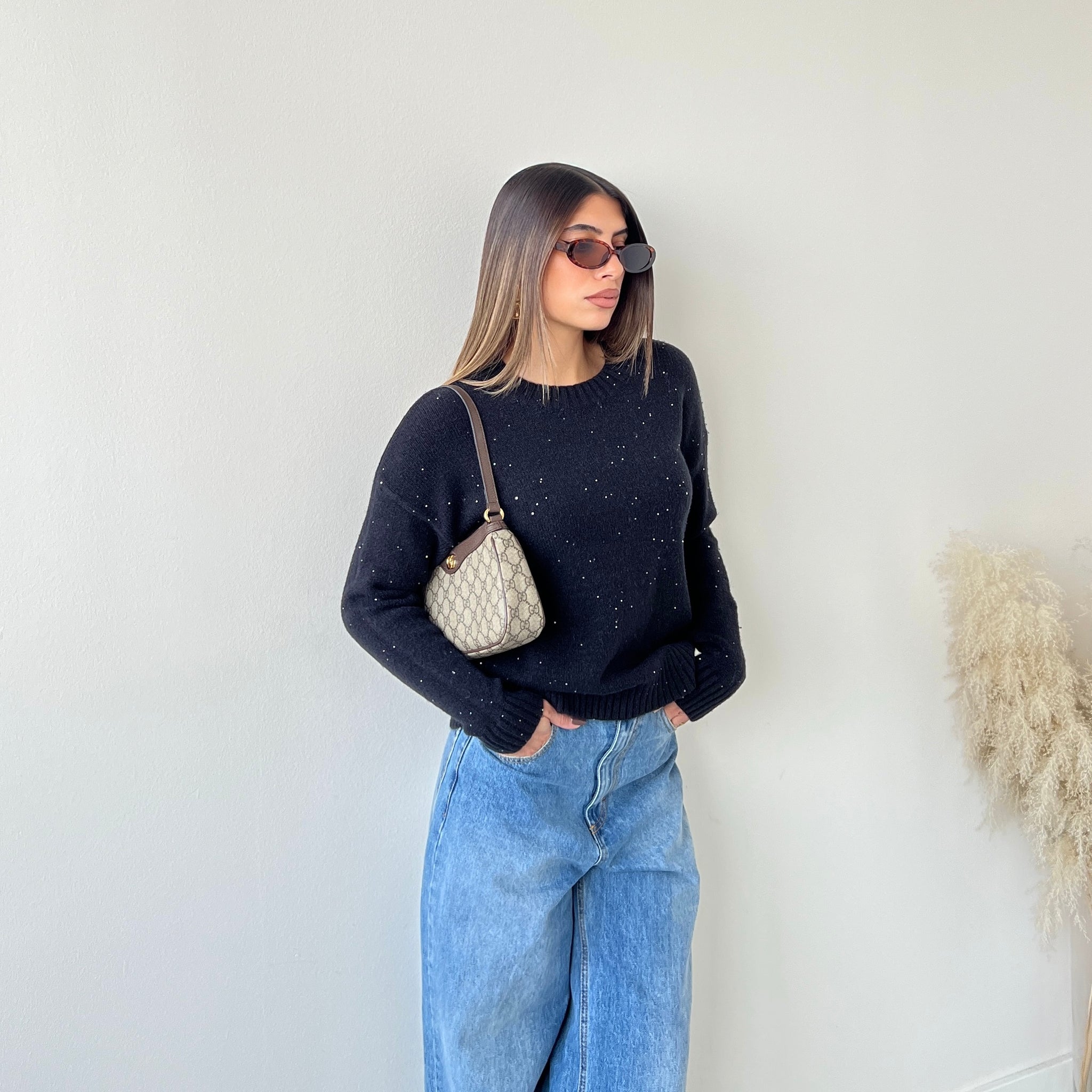 Pull con micro paillettes nero