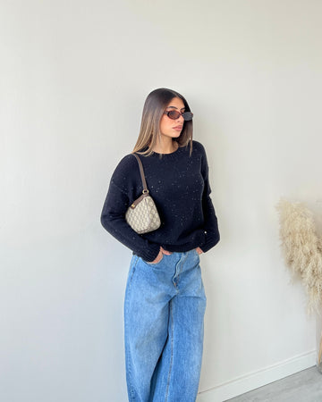 Pull con micro paillettes nero