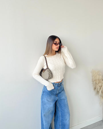 Pull corto con trecce crema