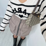 Gonna tasche e zip tortora