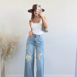 Jeans con strappi con sangallo 5404