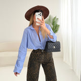 Camicia a righe larghe azzurra