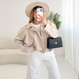 Giubbino mezza stagione con zip beige
