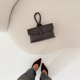 Borsa pochette con manico testa di moro