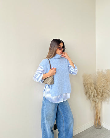 Gilet dolcevita con fiocchi celeste