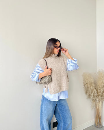 Gilet dolcevita con fiocchi beige