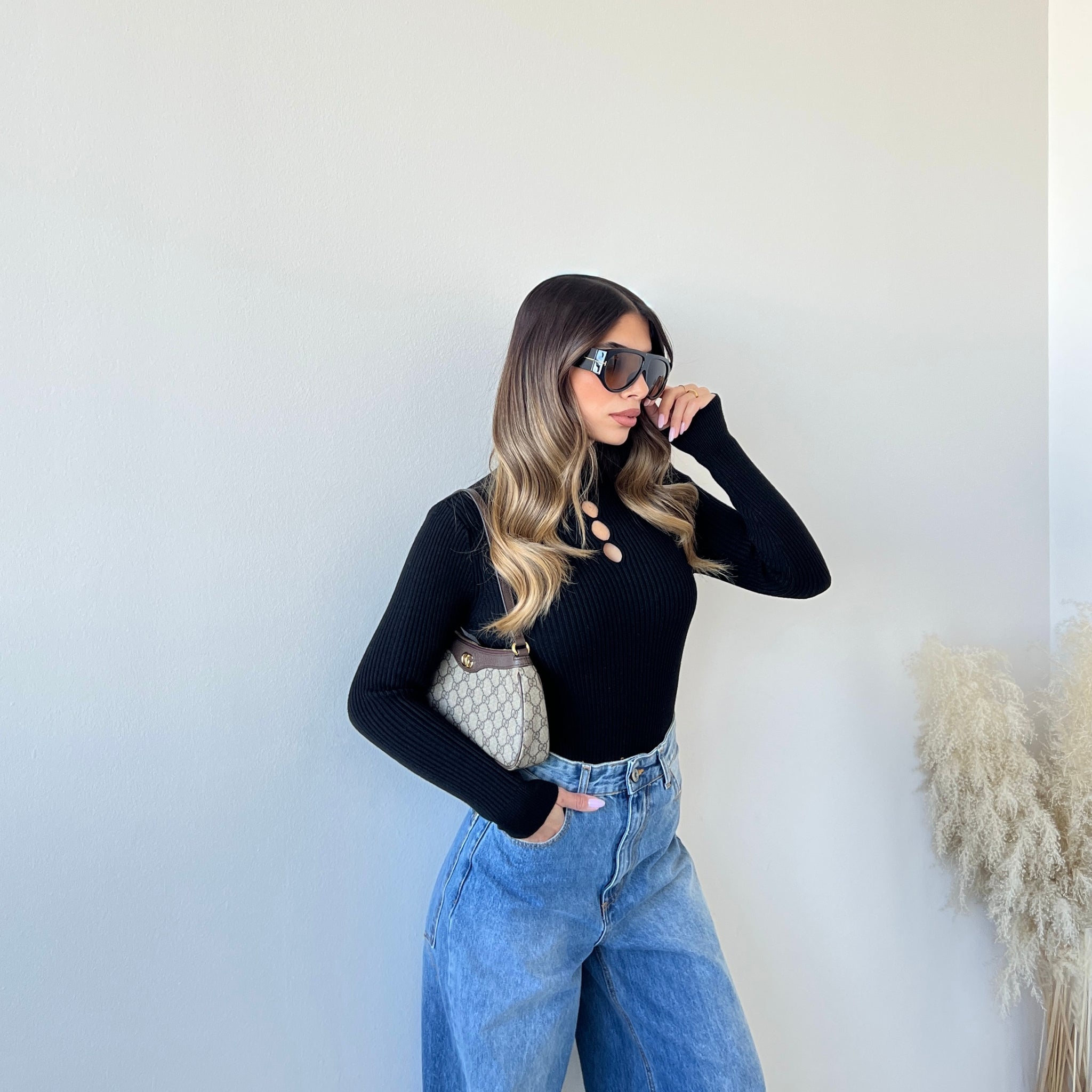 Maglia gocce a costine nera