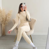 Coordinato modellante active wear con manica a guanto beige
