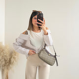 Maglia smanicata con camicia bacchettata con strass beige