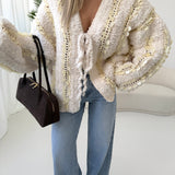 Maxi cardigan Bouclé con paillettes beige