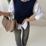 Gilet girocollo bicolore blu e fango