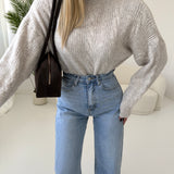 Pullover collo alto con trecce beige