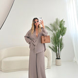 Pantalone effetto raso fango