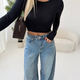 Maglia crop in tessuto elastico nera