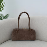 Borsa Claire in vera pelle suede fango