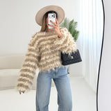 Pullover a pelo lungo beige