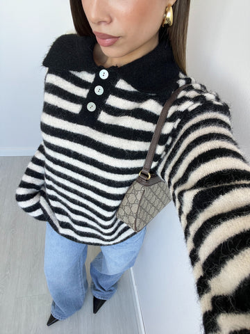 Pullover a polo a righe nero e bianco