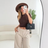 Polo con trecce a manica corta brown