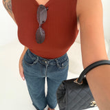 Maglia smanicata a costine ruggine