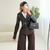 Chiodo classico con zip nero