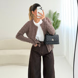 Cardigan con trecce e bottoni foderati fango