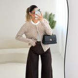 Cardigan con trecce e bottoni foderati sabbia