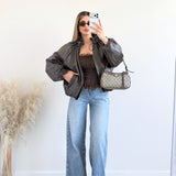 Giubbino in simil pelle con collo arricciato brown