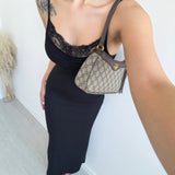 Abito costine con pizzo e spacco laterale nero