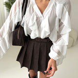 Camicia a balze voulant bianca